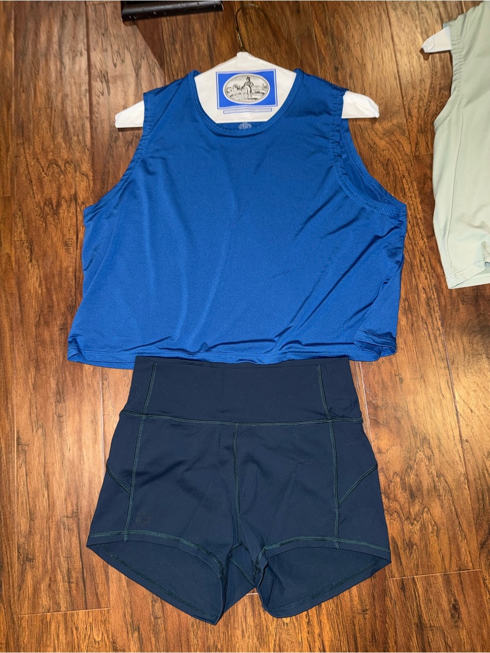 Royal Blue Cropped Workout Tank with Navy High-Waist Athletica Shorts
